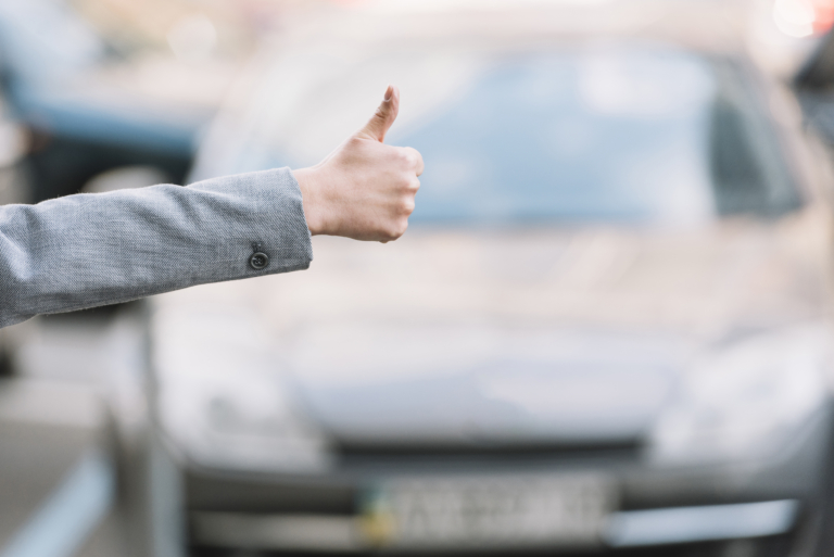 businesswoman-calling-taxi